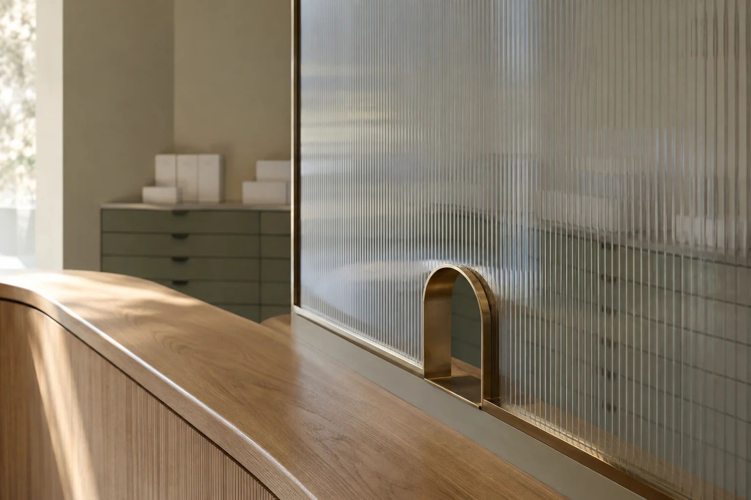 Illustrative pharmacy counter with ribbed glass and warm wooden cabinetry