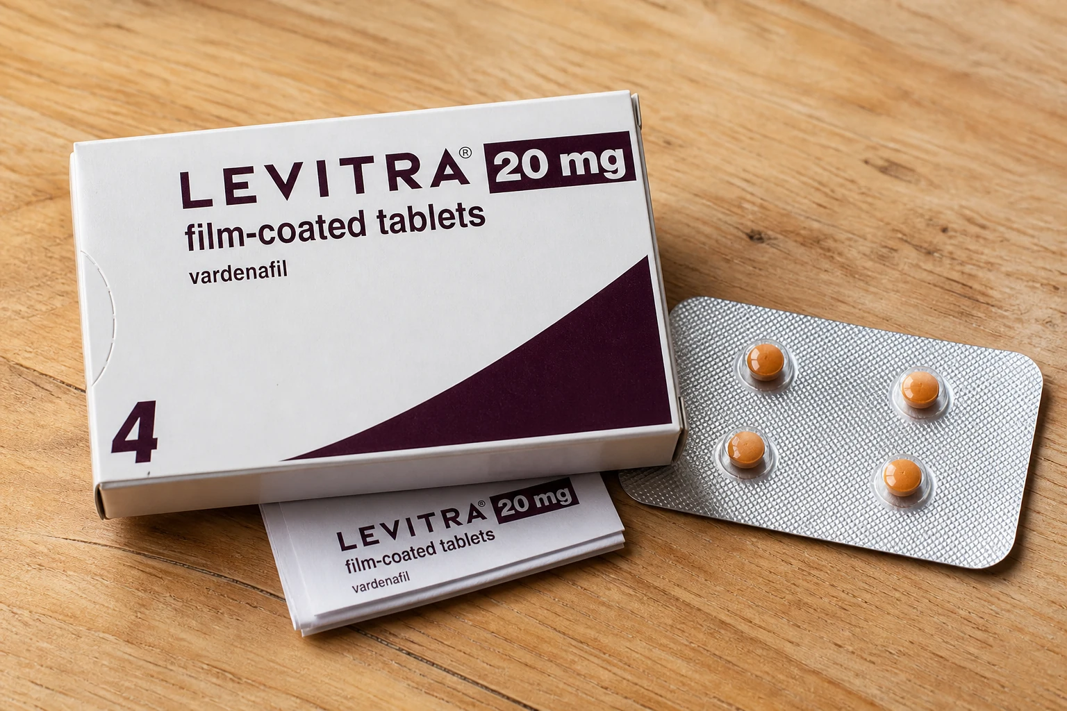 Levitra 20 mg carton, folded leaflet and four orange tablets in a silver blister